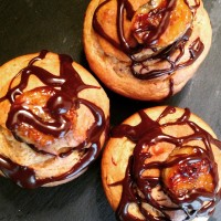 Fluffy Banana Cupcakes Topped With Chocolate Ganache And Caramelized Bananas
